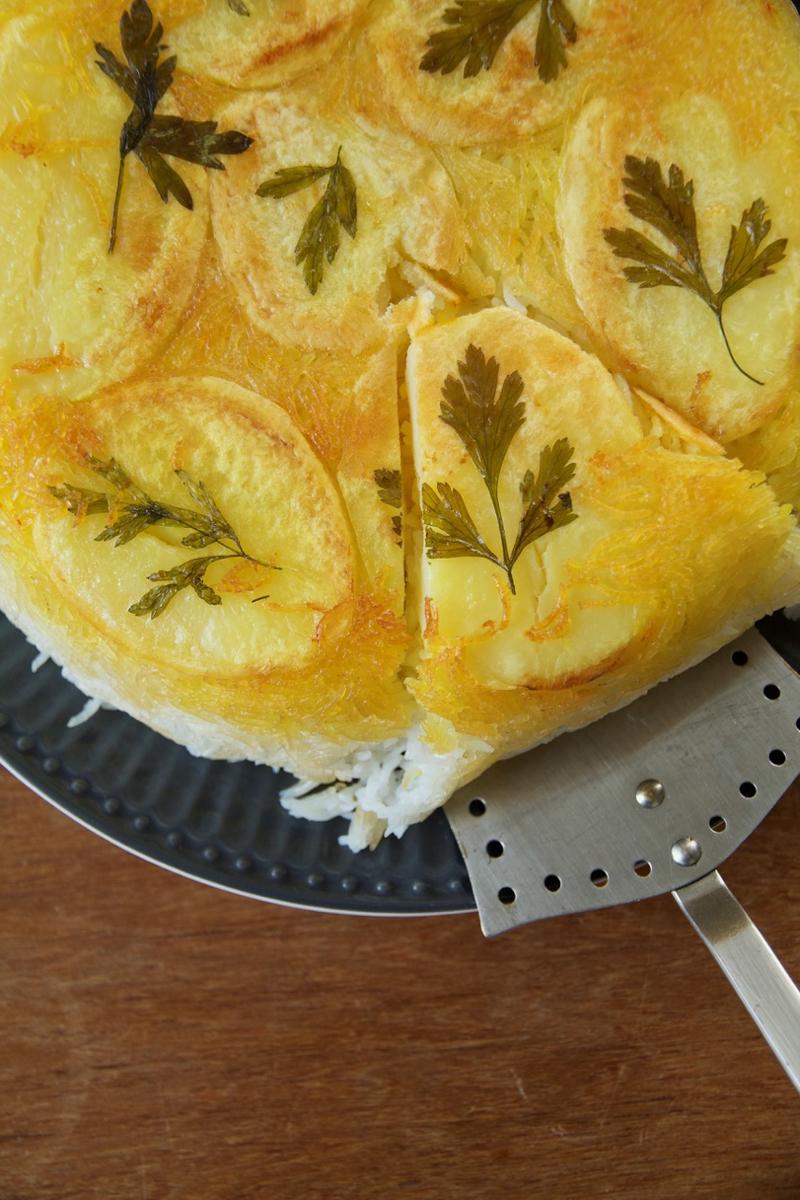 Rezeptbild: Persisches Polo mit Kartoffel Tahdig im Reiskocher von Reishunger