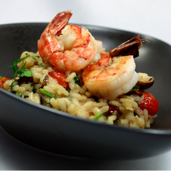 Rezeptbild: Krustentier-Risotto mit Tomaten und Manchego
