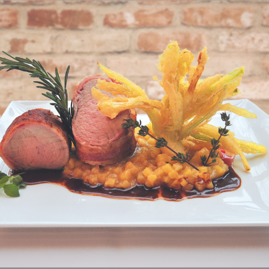 Rezeptbild: Schweinefilet mit Kartoffelrisotto und Frühlingslauch