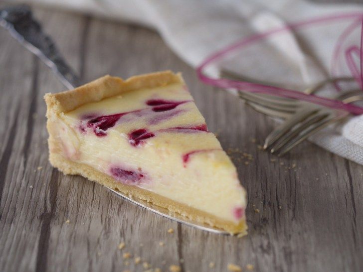 Rezeptbild: Cheesecake mit weißer Schokolade und Himbeeren