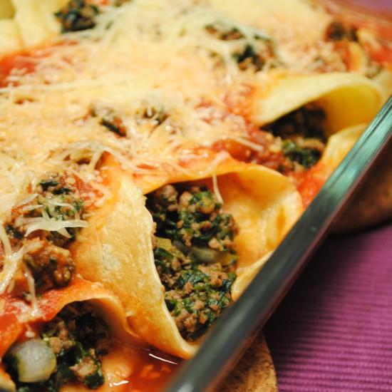 Rezeptbild: Gefüllte Pfannkuchen mit Spinat und Hackfleisch - überbacken