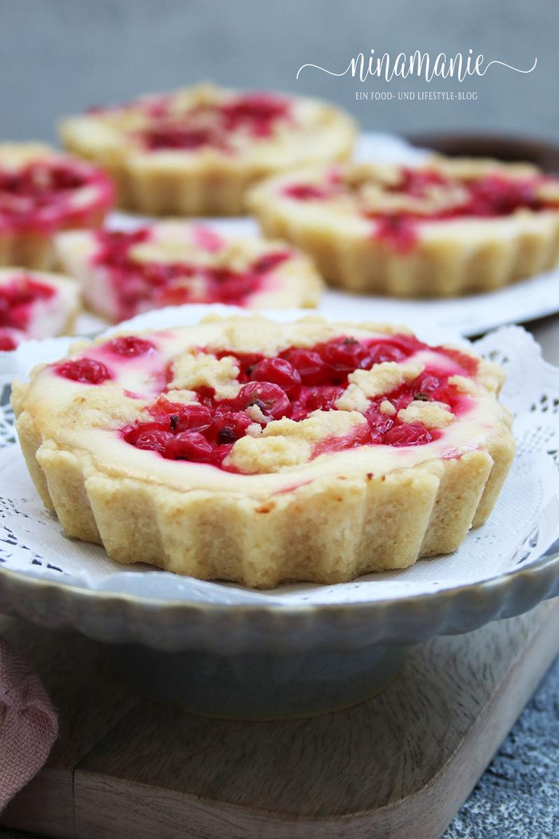 Rezeptbild: Zitrus-Käsekuchen-Tartelettes mit Johannisbeeren