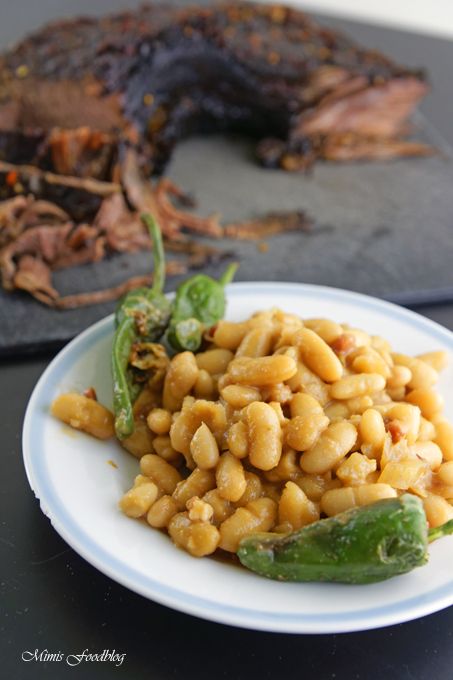 Rezeptbild: Texas BBQ Brisket aus dem Dutch Oven mit smoky Baked Beans ~ rustikales Outdoor Cooking