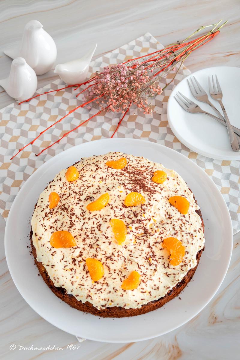 Rezeptbild: Marmor-Mandarinen Kuchen mit Mandarinen-Frischkäsecreme