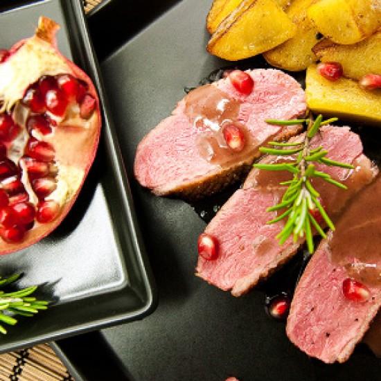 Rezeptbild: Entenbrust 80° C mit Granatapfel-Rotwein-Sauce Rezept