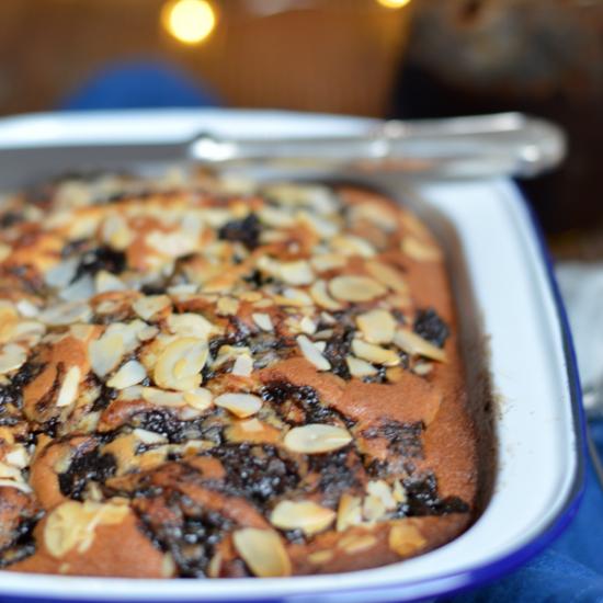 Rezeptbild: Pflaumenmuskuchen mit Zimt, Mandeln und Puderzucker
