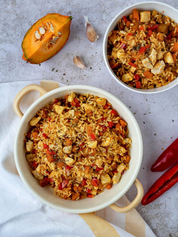 Rezeptbild: Schnelle Reispfanne mit Kürbis, Paprika und Hühnchen