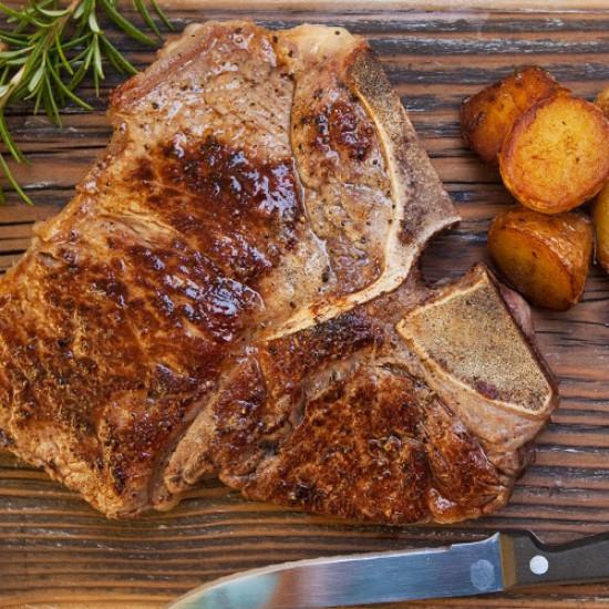 Rezeptbild: T-Bone Steak mit Speckbohnen und Bratkartoffeln