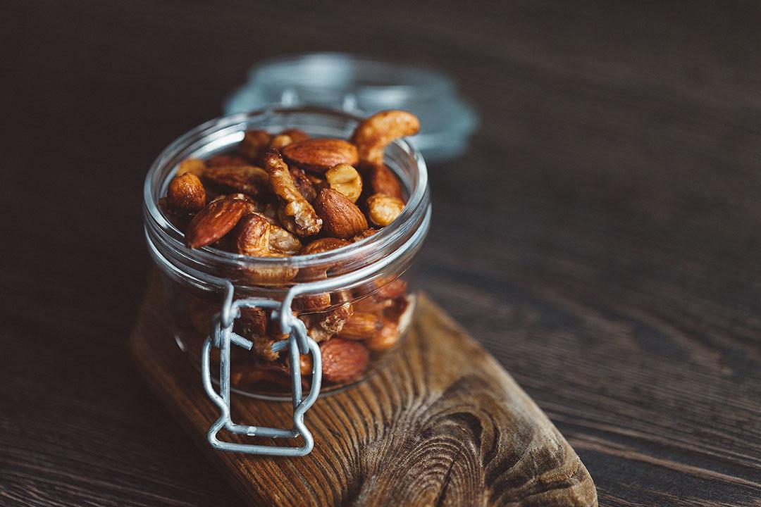 Rezeptbild: Gesunder Snack - Nüsse mit Orange und Honig