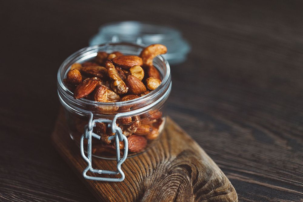 Rezeptbild: Gesunder Snack - Nüsse mit Orange und Honig