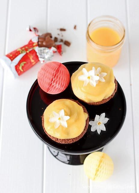 Rezeptbild: Schokoladen Cupcakes mit Blutorangen Curd