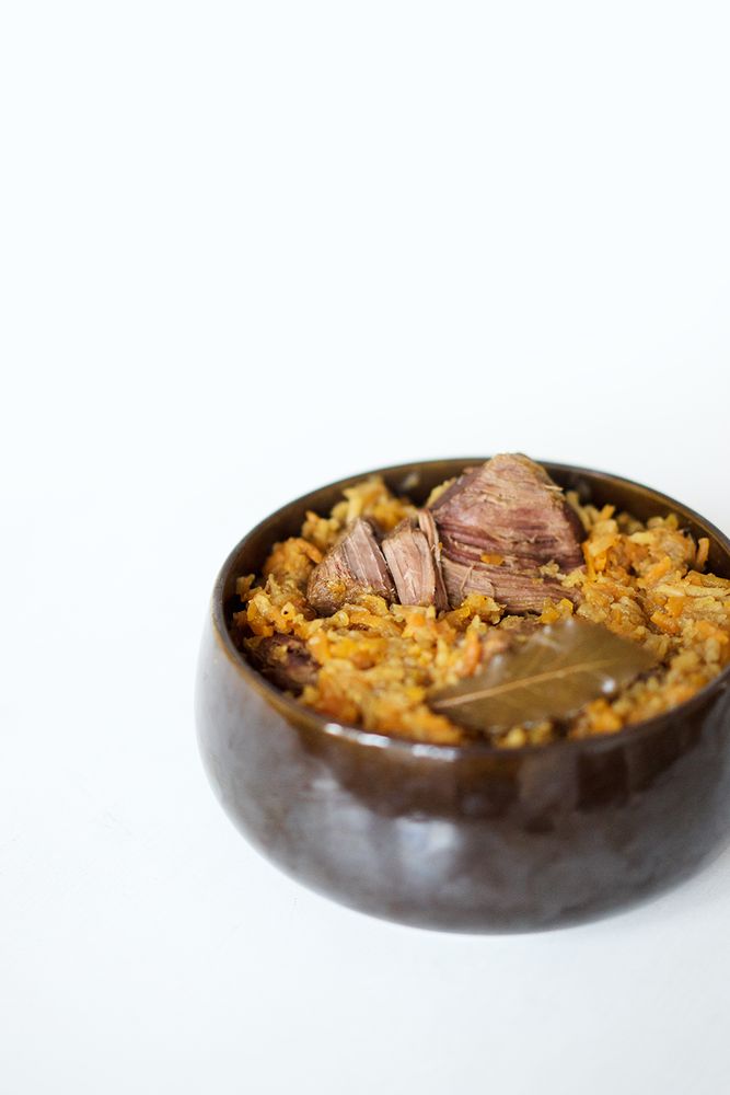 Rezeptbild: Geschmortes Rindfleisch mit Möhren, Knollensellerie und Zwiebeln
