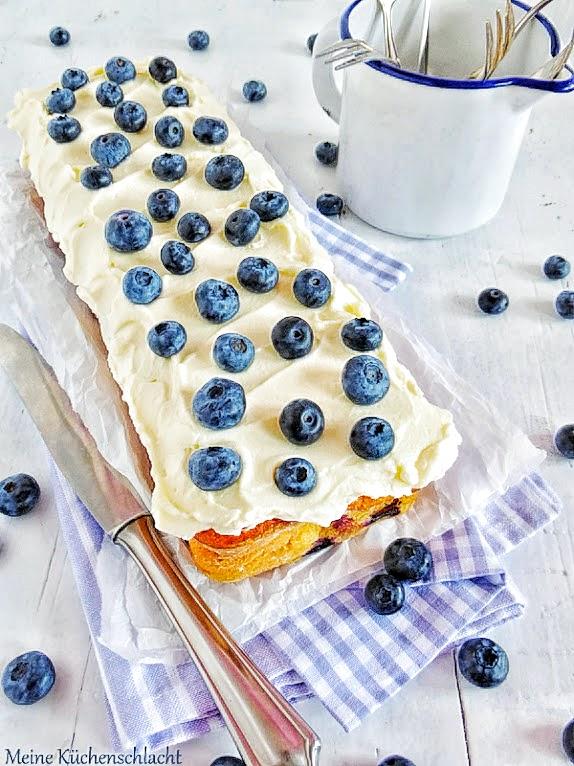 Rezeptbild: Blaubeer-Orange Kuchen mit Frischkäse Buttercreme