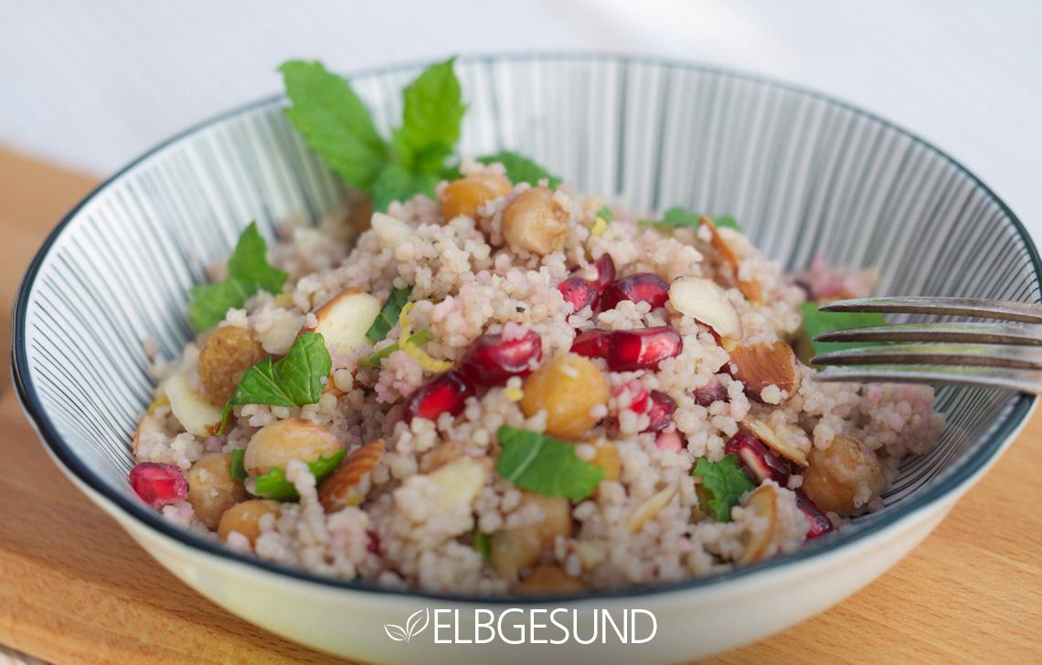 Rezeptbild: Orientalisches Couscous mit würzigem Kreuzkümmel und fruchtigen Granatapfelkernen