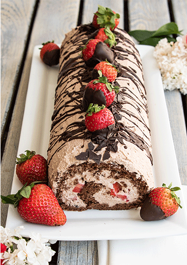 Rezeptbild: Schoko-Biskuitrolle mit Erdbeeren