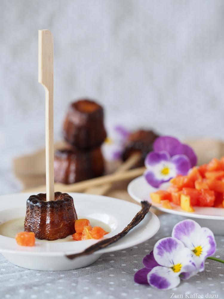 Rezeptbild: Cannelés mit Papaya und Vanille-Soße