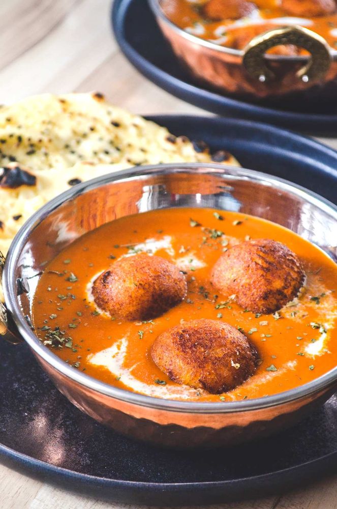 Rezeptbild: Malai Kofta – Indische Käsebällchen in cremiger Tomatensauce