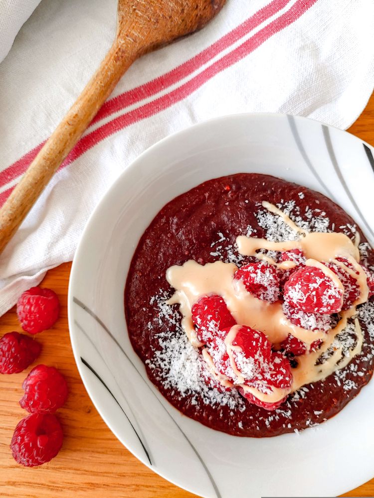 Rezeptbild: Schoko-Kokos-Porridge mit Himbeeren