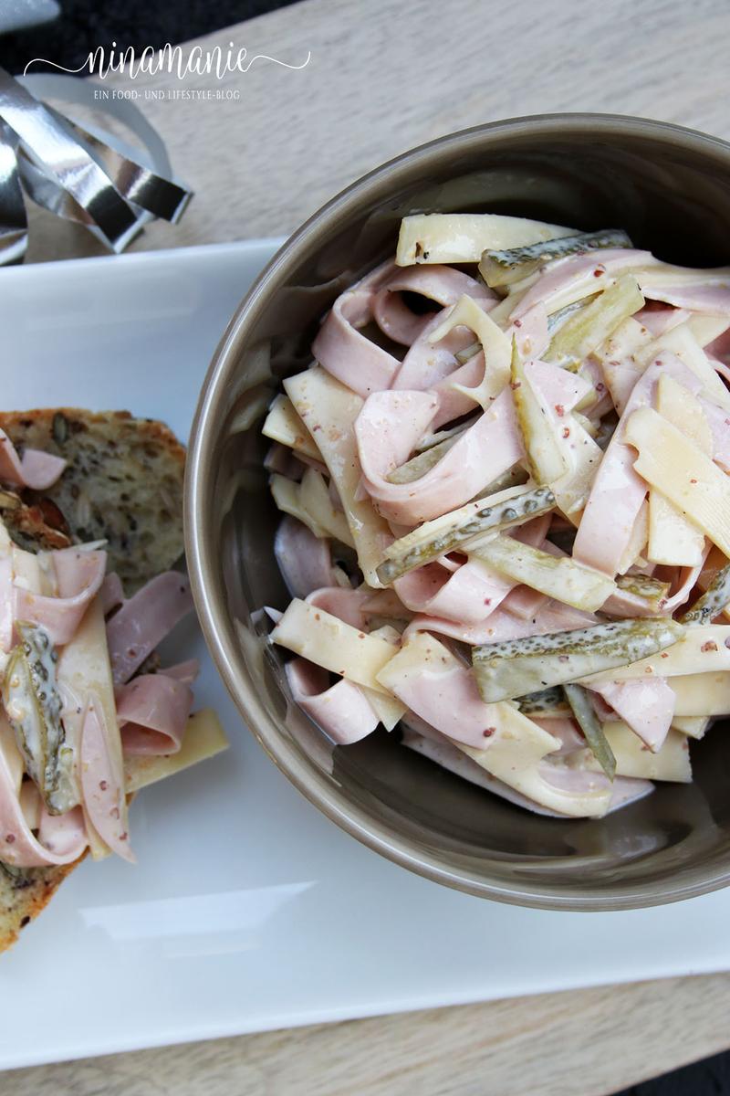 Rezeptbild: Wurstsalat mit Käse und Gürkchen