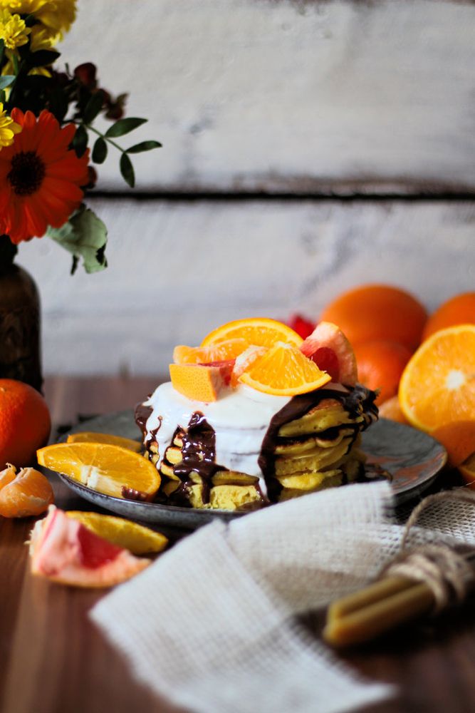 Rezeptbild: Zitrus Pancakes mit Schokoladensoße und Ahorn-Creme 